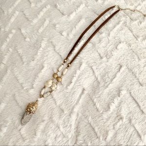 Beaded necklace with stone